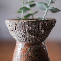 Vase with textured wide top