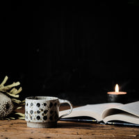 Cup in spotty white