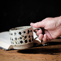 Cup in spotty white