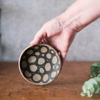 Small Dish with Circles and Orange Shino base