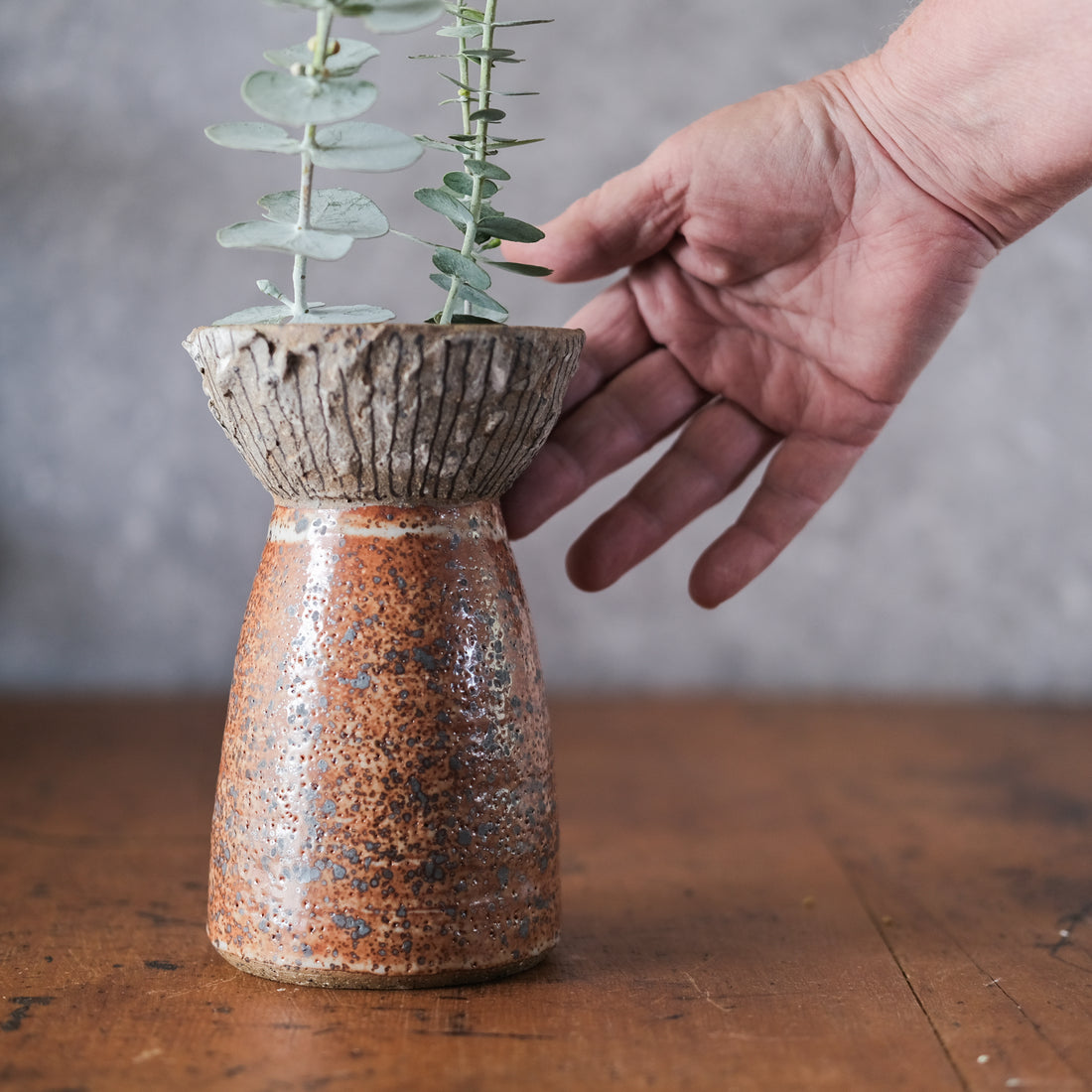 Vase with textured wide top