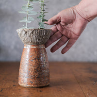 Vase with textured wide top