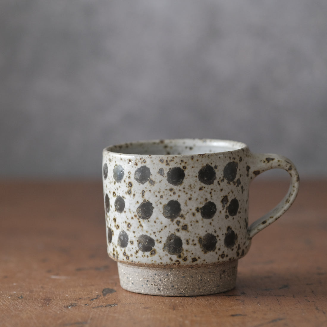 Mostly stacking cup in spotty white