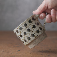 Mostly stacking cup in spotty white