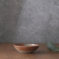 Small Dish with lines and shino orange glaze